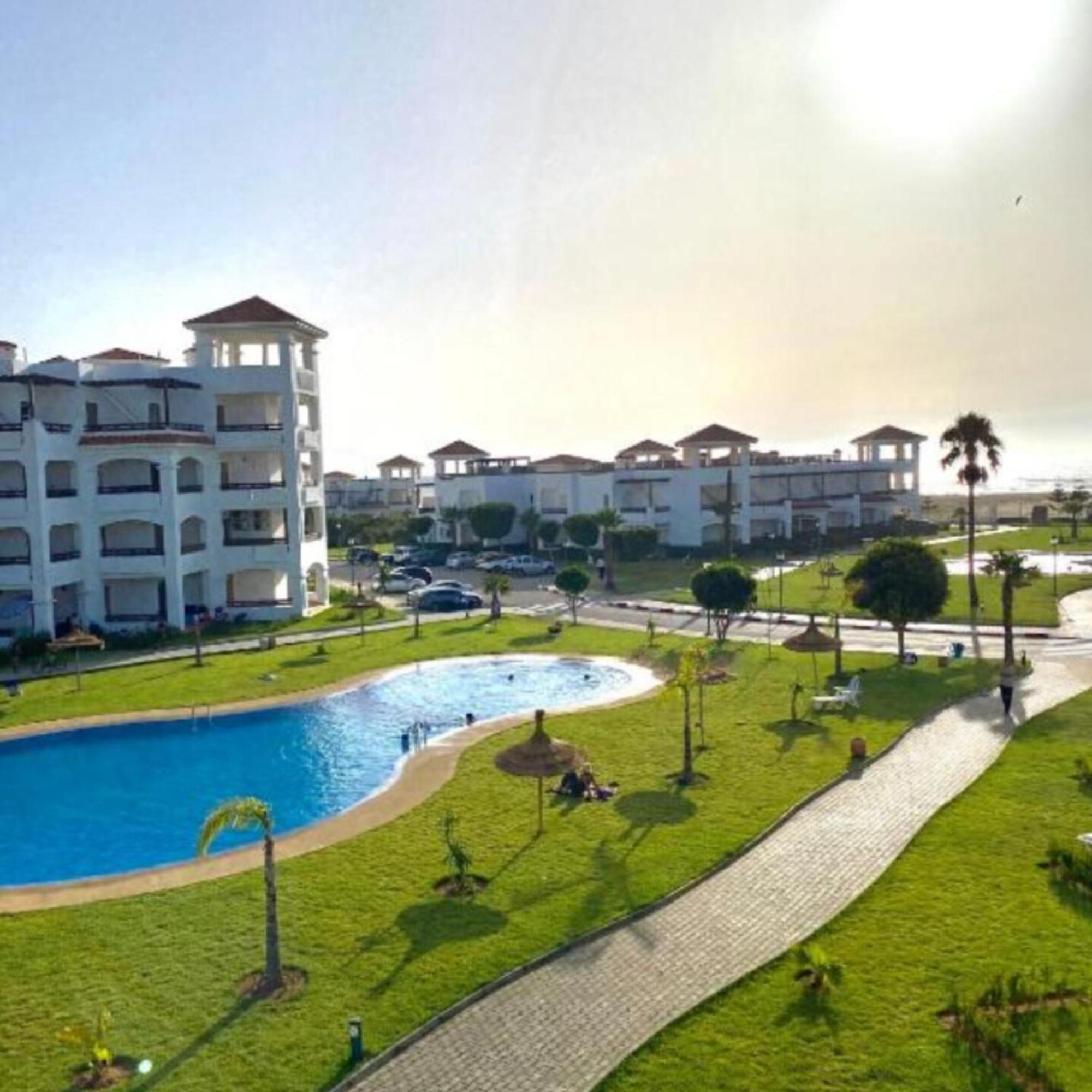 Seaside Poolside Apartment Асила Экстерьер фото
